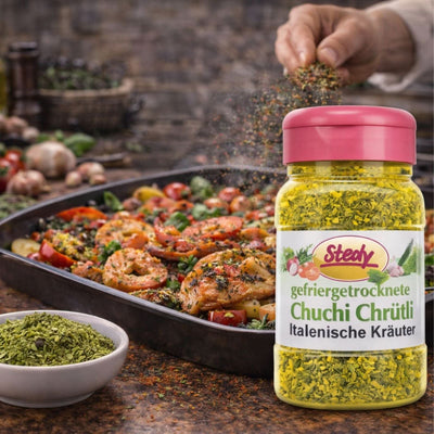 Stedy Italienische Kräuter beim Verfeinern eines Ofengerichts – mediterranes Aroma direkt aus dem pinken Streuer.
