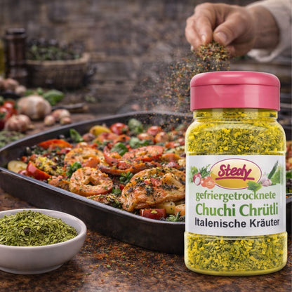 Stedy Italienische Kräuter beim Verfeinern eines Ofengerichts – mediterranes Aroma direkt aus dem pinken Streuer.
