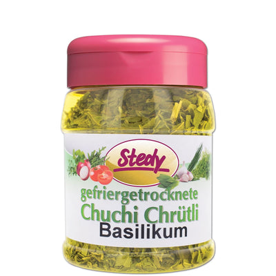 Gefriergetrocknetes Basilikum von Stedy im pinken Streuer mit Etikett „Chuchi Chrütli“ auf weissem Hintergrund.