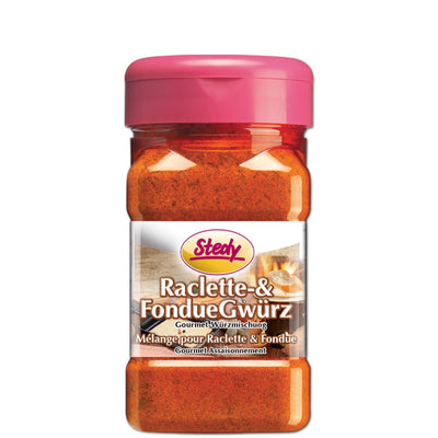 Stedy Raclette- & FondueGewürz im typischen Streuer mit rosa Deckel – freigestellt auf weissem Hintergrund.